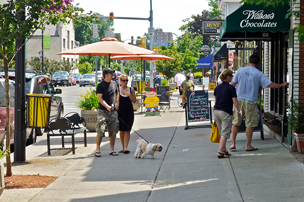 people walking along elmwood ave sidewalk in Buffalo, New York