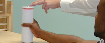 participant getting their reach range measured with a Faro arm in a anthropometry study